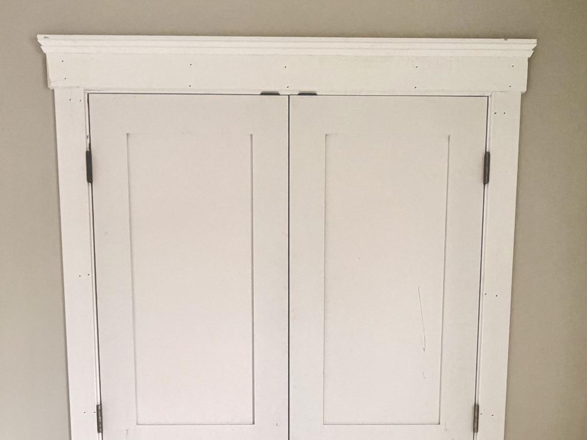 Double closet doors with craftsman casing